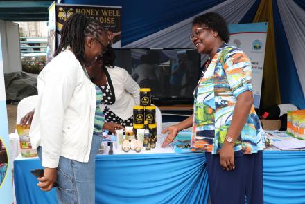 Mrs. Rose Marete and Breanda, a WBI exhibitor at WEE Hub exhibition booth