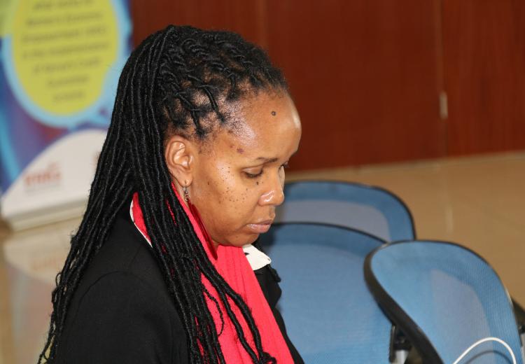 Dr. Nkatha Kabira follows discussions during meeting