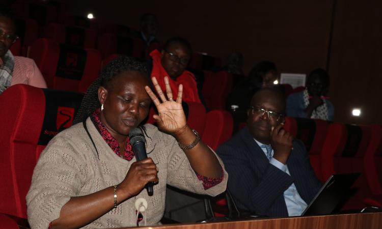 participant contributes to discussions during forum