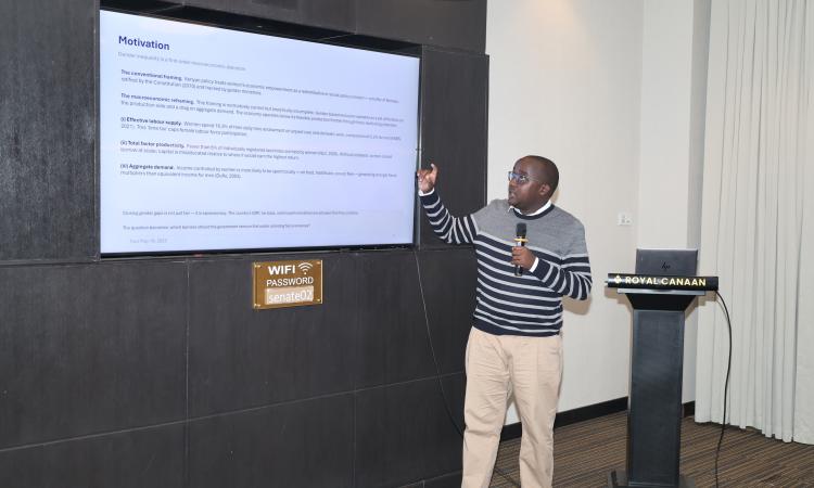 Mr. Leo Kemoi presenting the economic analysis